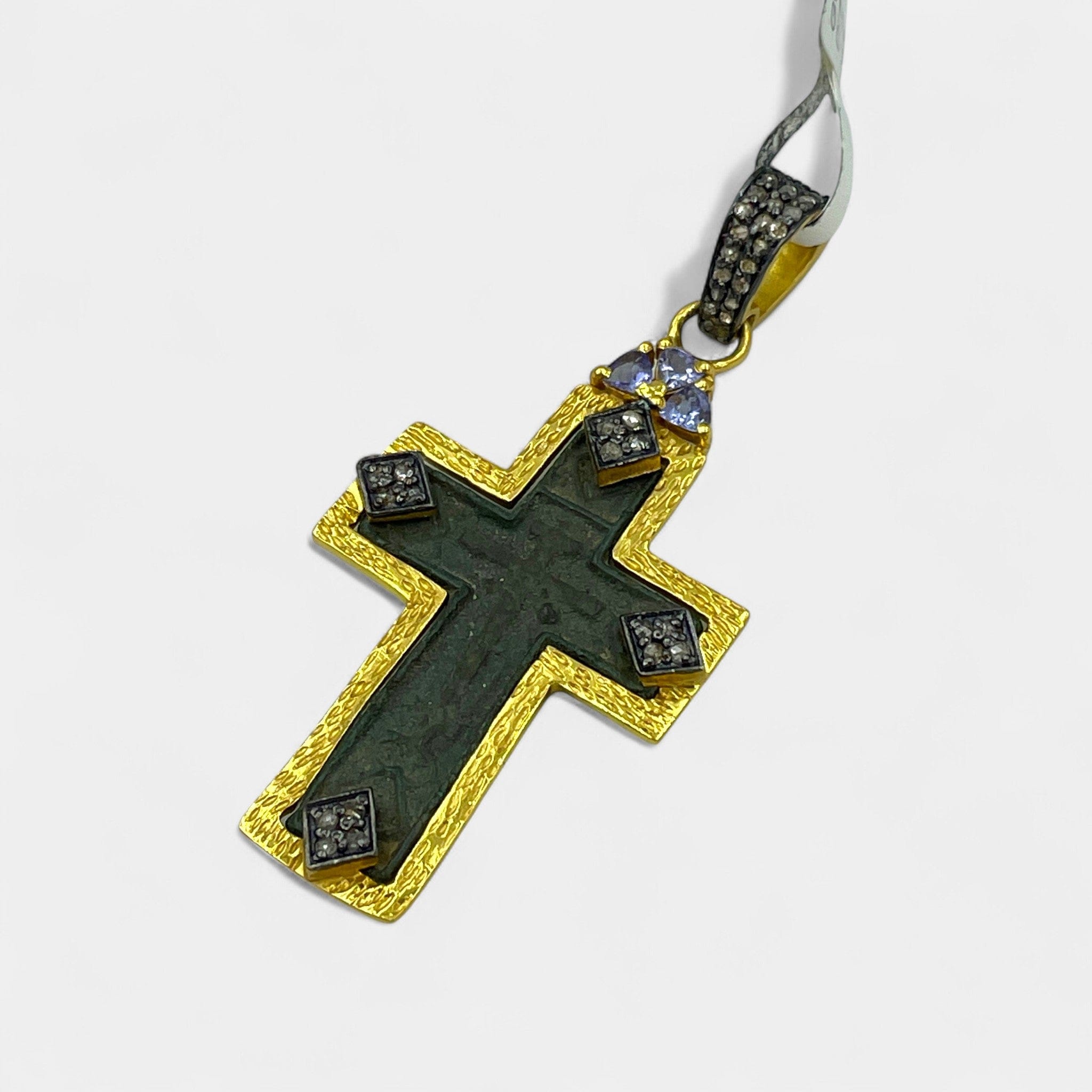 Detail of violet tanzanite (0.33ct) and 43 natural diamonds (0.39ct total) on antique Russian Old Believers cross pendant in 24kt gold-plated silver


