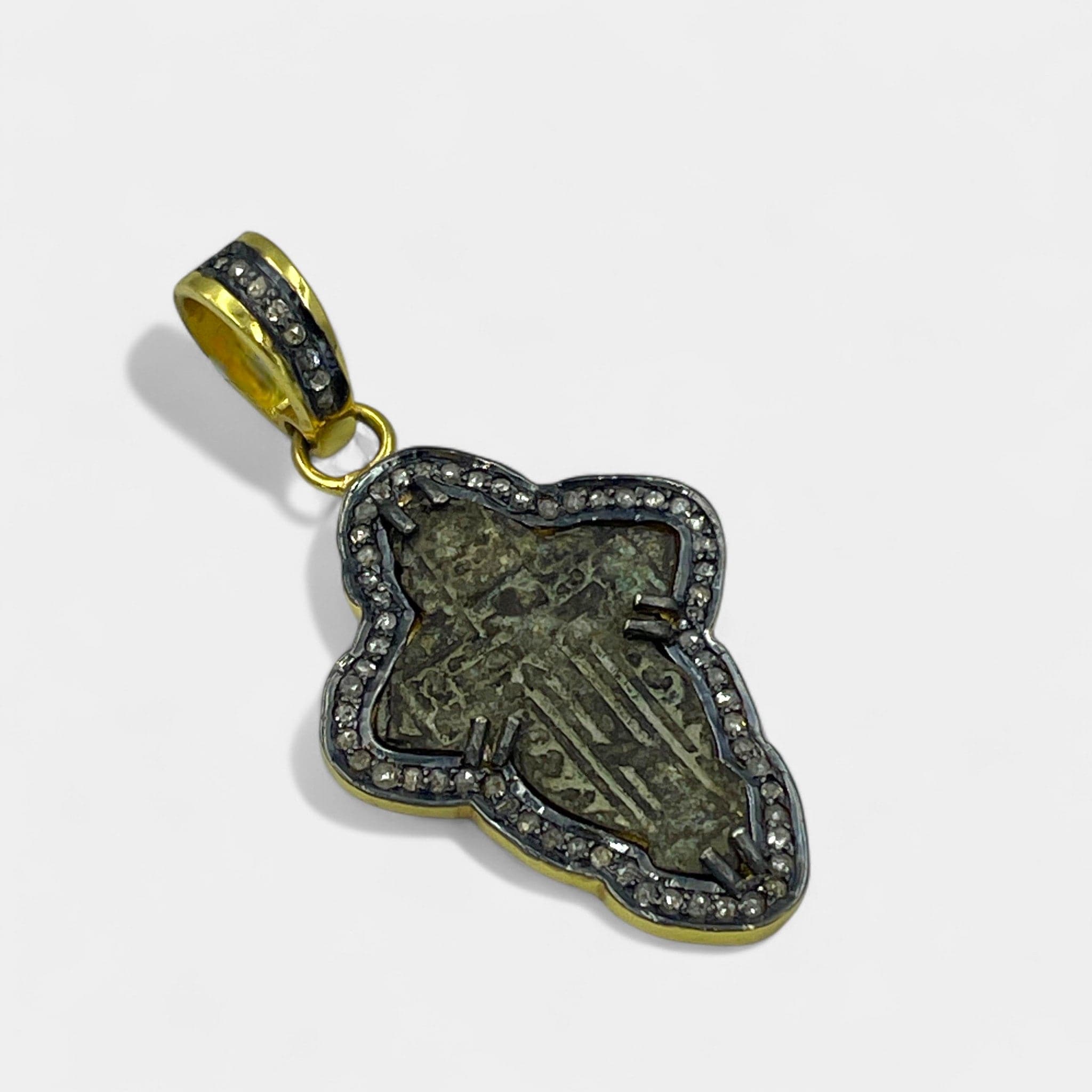 Detail of 66 natural diamonds (0.65ct total) on antique Russian Old Believers cross pendant in 24kt gold-plated silver


