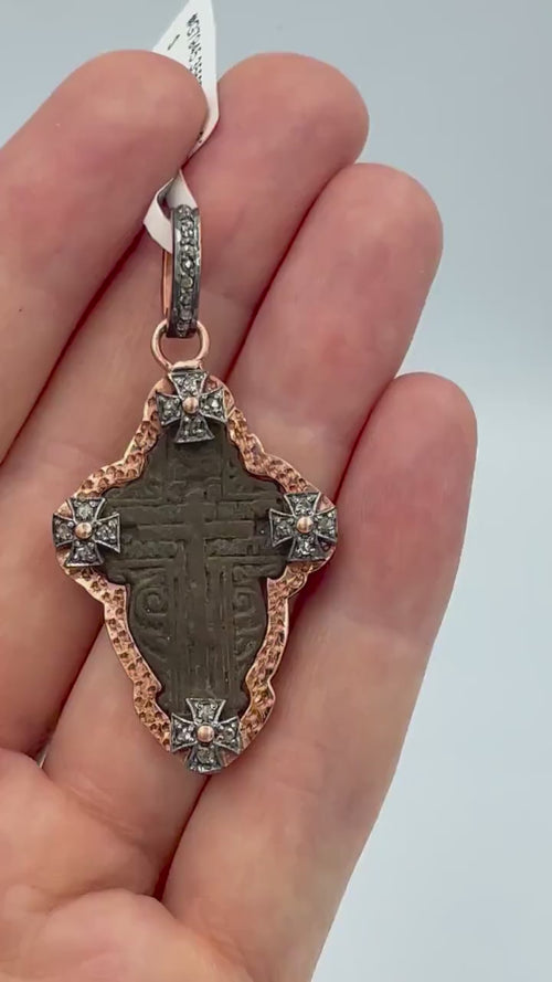 Antique Russian Old Believers Orthodox cross showcasing on hand