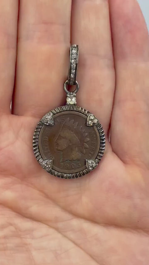 Authentic 1905 Indian Head Penny Necklace - Liberty's Gaze Pendant with Natural Diamonds showcasing on hand.